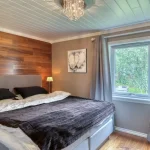 Master bedroom, fantastically quiet and lovely bedroom, with air conditioning, and large TV and chandelier in the ceiling providing great light. The bed is very good quality, size 180cm x 200xm /Kingsize.